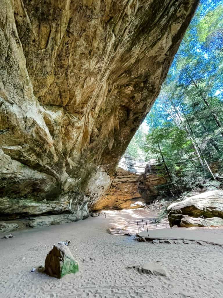 Ash Cave towering overhead is one of the Hocking Hills hikes