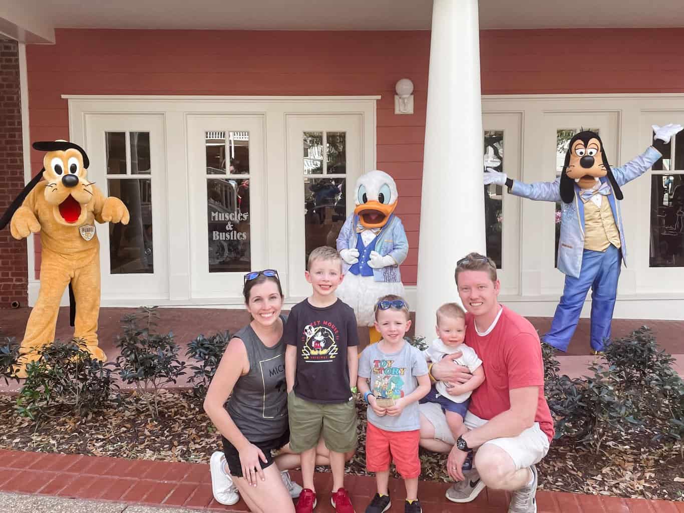 Family visiting with Disney characters at the BoardWalk at Disney World