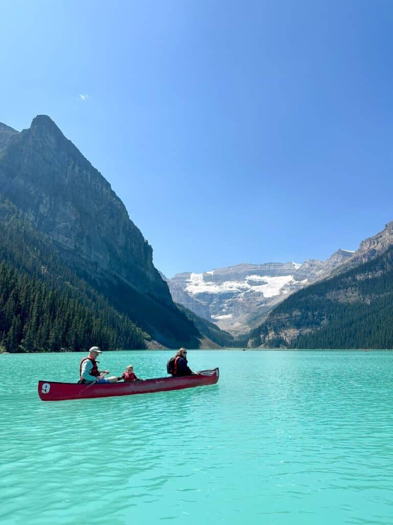 Canoeing on Lake Louise during family vacation to Banff