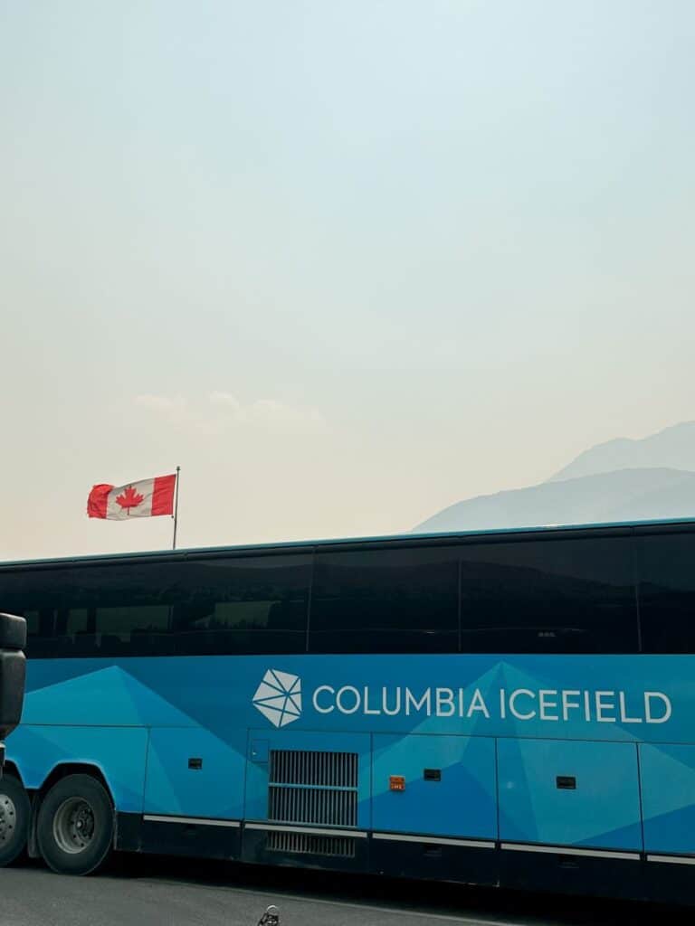 The charter bus for the Columbia Icefield Adventure during our trip to Banff with kids